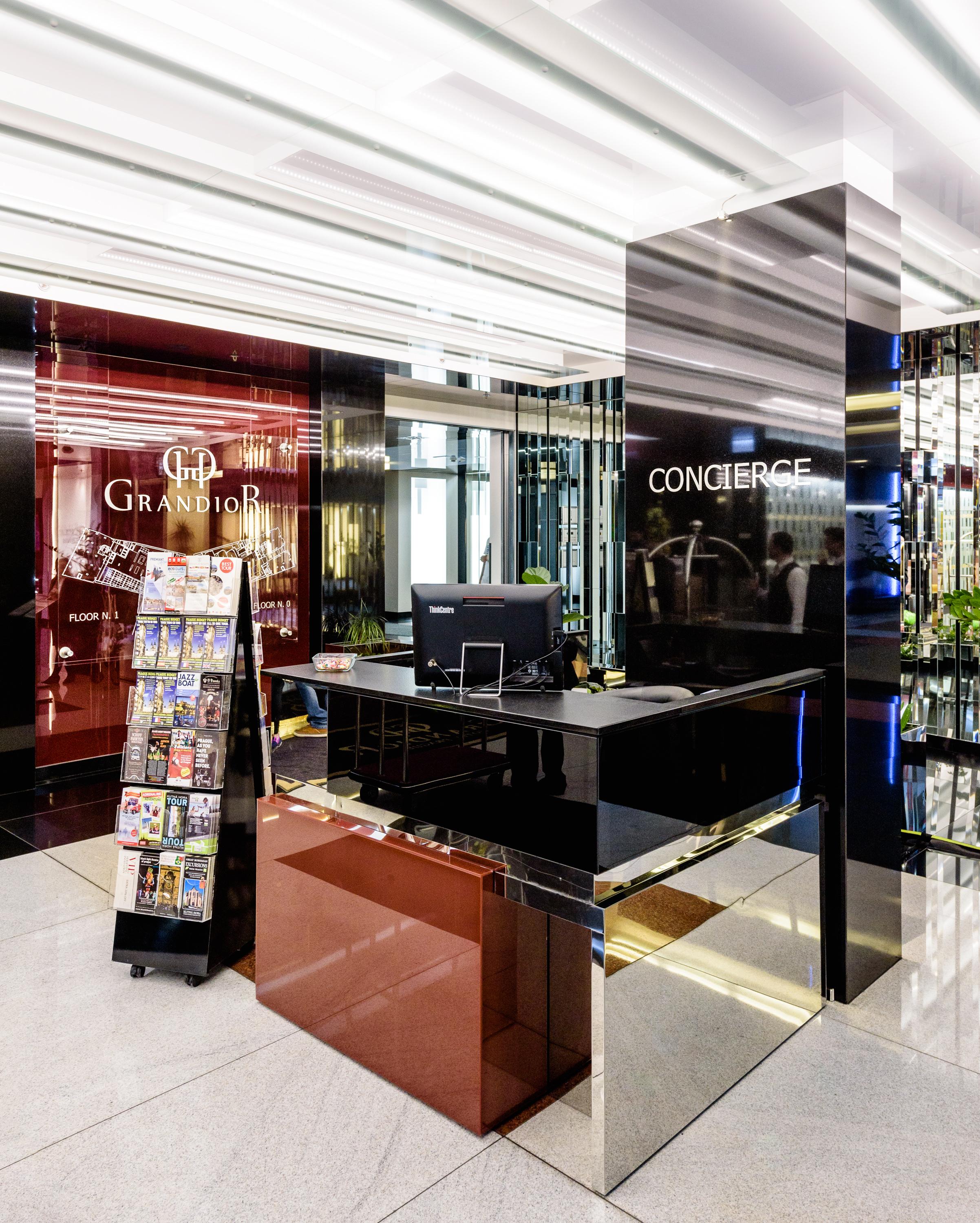 Grandior Hotel Prag Exteriör bild Concierge desk at the Grand Dior